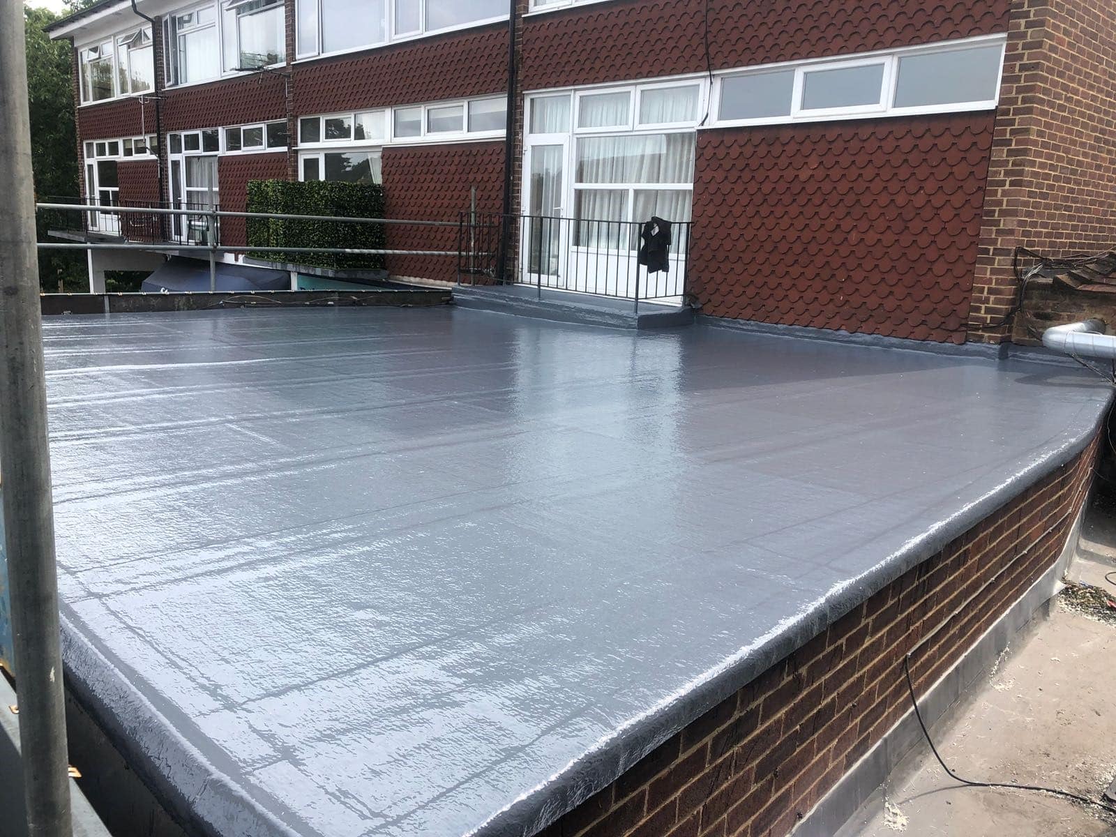 EPDM flat roof membrane installation on residential property
